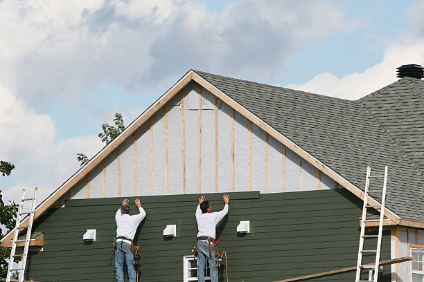 Professional Emergency Siding Repair technician working in Utica, OH